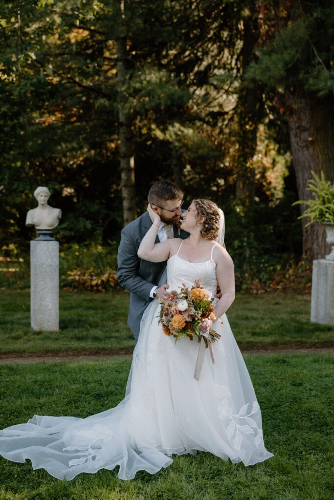 Bride and groom hugging at glen magna farms wedding