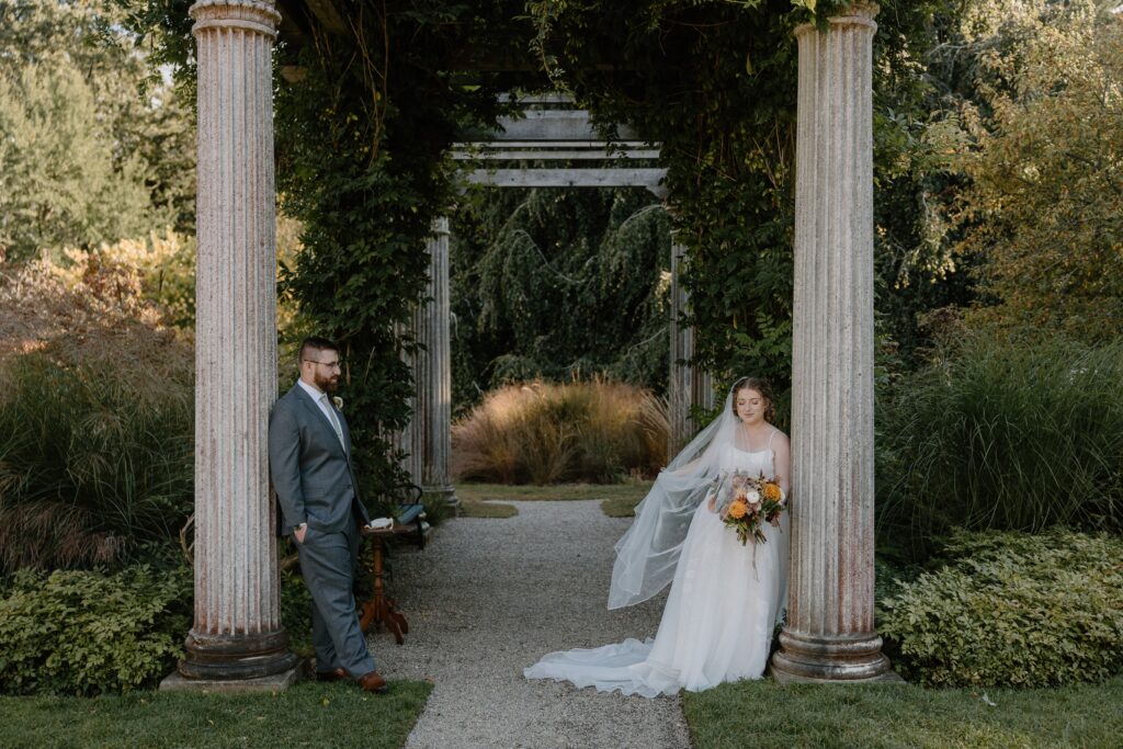 bride and groom posing for glen magna farms wedding photos