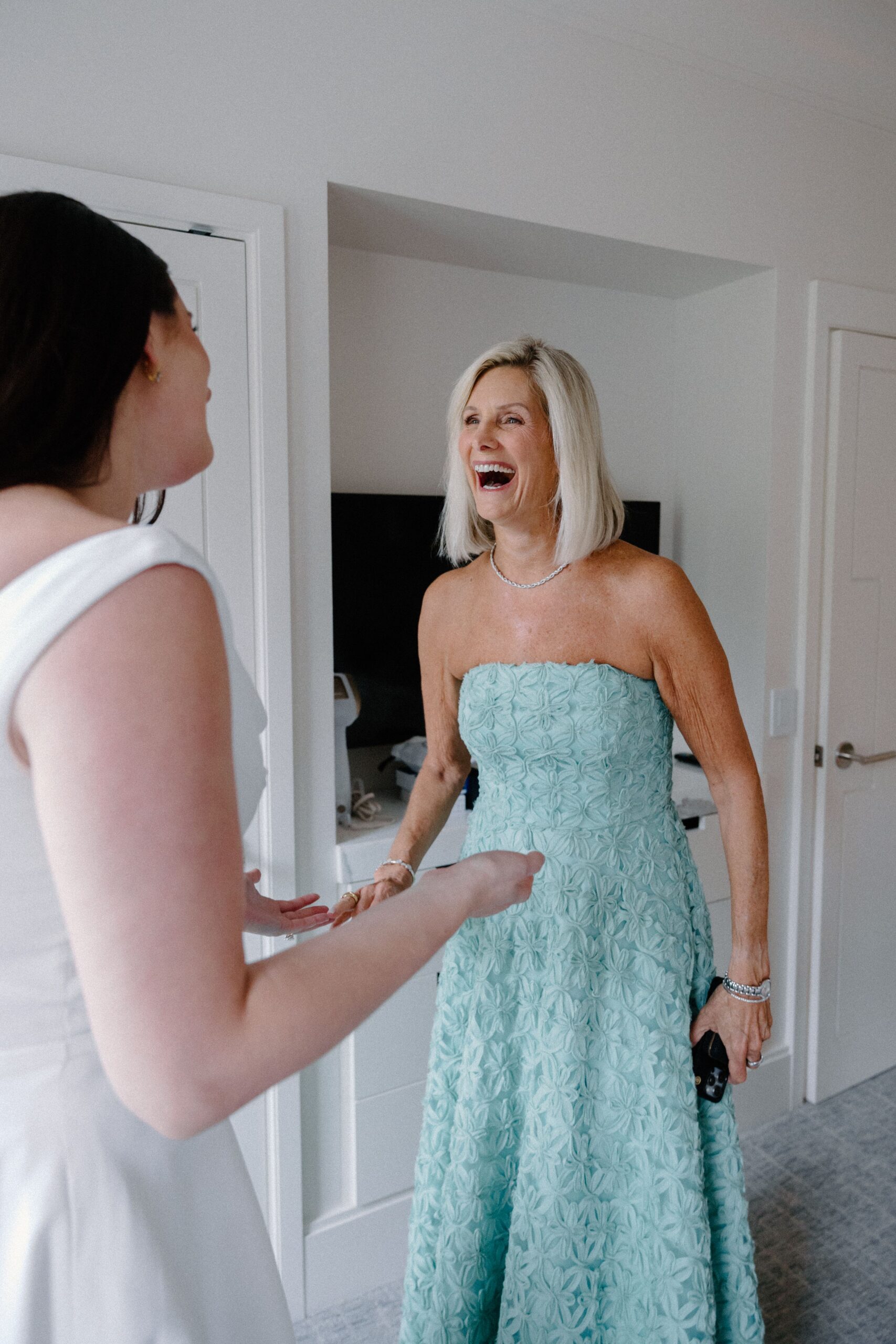 First look with brides mother at her wedding in Boston Public Garden.