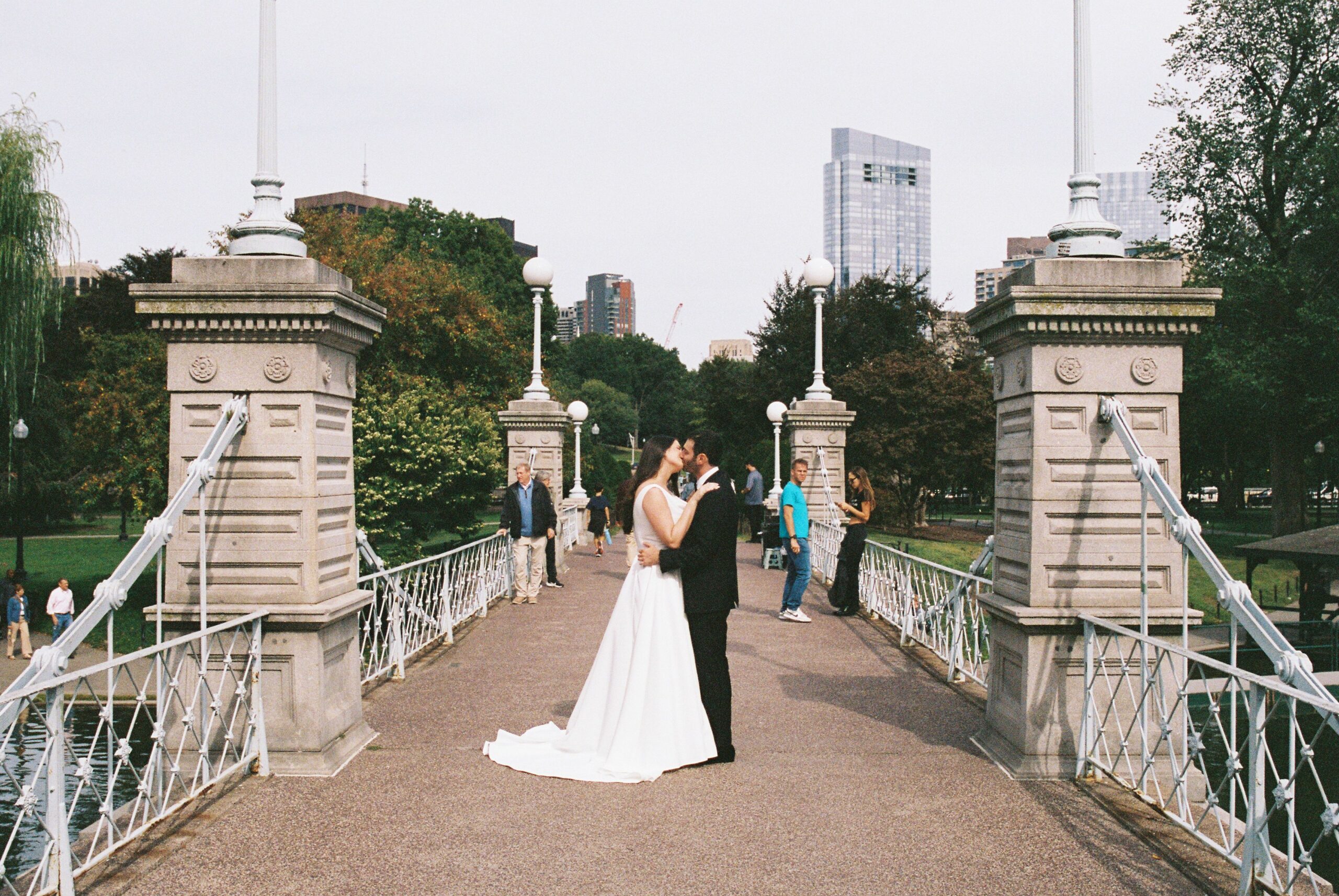 Bride and groom enjoying their Boston Public Garden wedding in one of Boston's most iconic parks.
