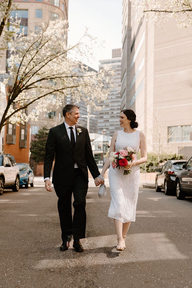 Newlyweds photographed together during their Boston wedding day